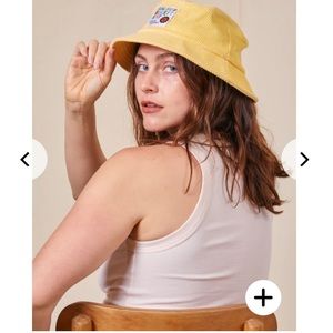 Big Bud bucket hat, yellow crystal wash, has kind of a tiedye look